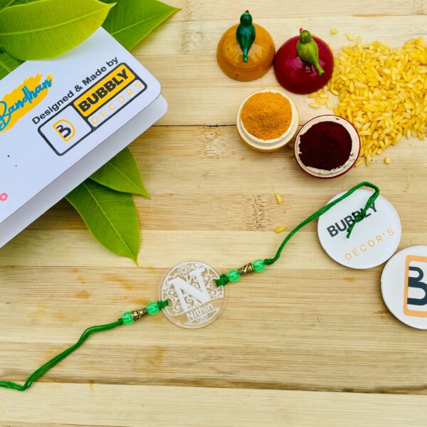 IMG_3419-pichi Name Alphabet Etching Rakhi - Bubbly Decors