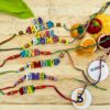 IMG_3482-pichi Colourful letters Rakhi - Bubbly Decors
