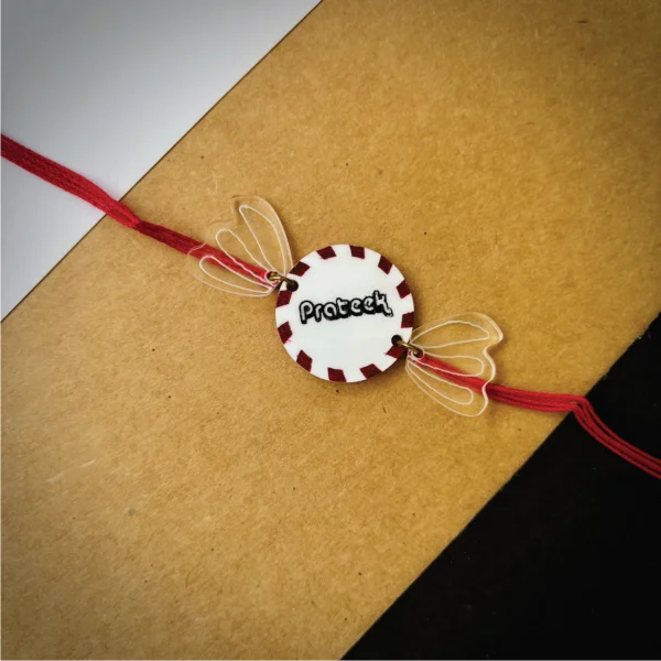 105-1-no-gift-chocolate-namerakhi-1.webp Chocolate Name Rakhi - Personalised Rakhi for Brother by Bubbly Decors