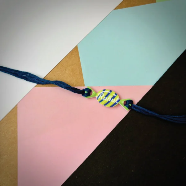107-1-no-gift-candy-stripes-rakhiyellow-1.webp Candy Stripes Rakhi Yellow - Personalised Rakhi for Brother by Bubbly Decors