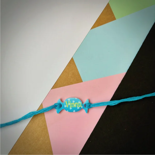 110-1-no-gift-candy-rakhi-smallblue-1.webp Candy Rakhi Small Blue - Personalised Rakhi for Brother by Bubbly Decors