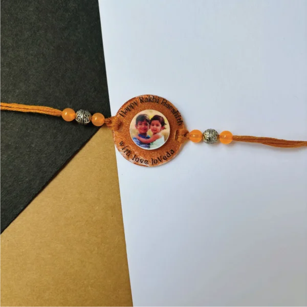 117-1-no-gift-bronze-metalic-photorakhi-1.webp Bronze Metalic Photo Rakhi - Personalised Rakhi for Brother by Bubbly Decors