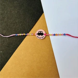132-1-no-gift-baby-carrakhi-1.webp Baby Car Rakhi - Personalised Rakhi for Brother by Bubbly Decors