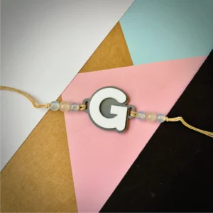 142-1-no-gift-alphabet-rakhipink-1.webp Alphabet Rakhi Pink - Personalised Rakhi for Brother by Bubbly Decors
