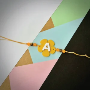 145-1-no-gift-alphabet-flower-rakhiYellow-1.webp Alphabet Flower Rakhi Yellow - Personalised Rakhi for Brother by Bubbly Decors