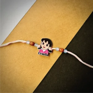 21-1-no-gift-Shizuka-doremon-namerakhi-1.webp Shizuka Doremon Name Rakhi - Personalised Rakhi for Brother by Bubbly Decors