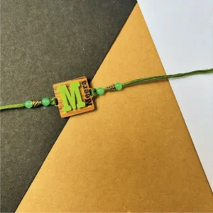 3-1-no-gift-wood-initial-name-rakhigreen-1.webp Wood Initial Name Rakhi Green - Personalised Rakhi for Brother by Bubbly Decors