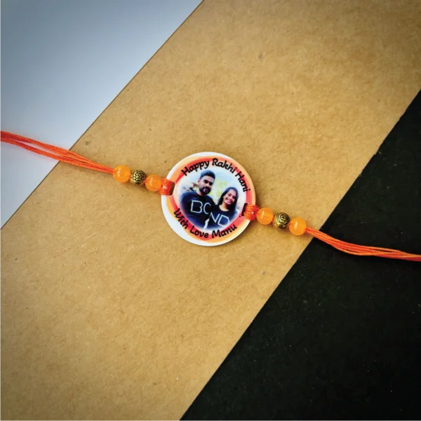 34-1-no-gift-photo-names-rakhired-1.webp Photo Names Rakhi Red - Personalised Rakhi for Brother by Bubbly Decors