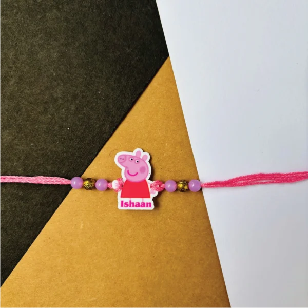 35-1-no-gift-peppa-pig-sisterrakhi-1.webp Peppa Pig Sister Rakhi - Personalised Rakhi for Brother by Bubbly Decors