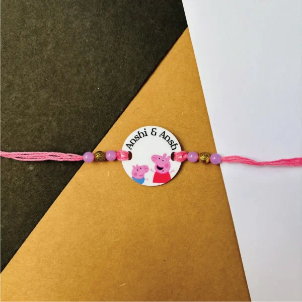 37-1-no-gift-peppa-pic-siblingsrakhi-1.webp Peppa Pic Siblings Rakhi - Personalised Rakhi for Brother by Bubbly Decors