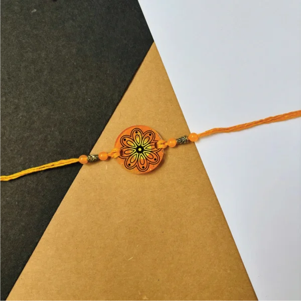 57-1-no-gift-mandala-metalic-paintedrakhi-1.webp Mandala Metalic Painted Rakhi - Personalised Rakhi for Brother by Bubbly Decors