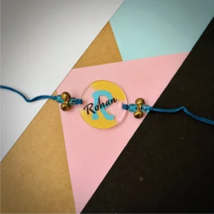 91-1-no-gift-designer-name-with-alphabet-rakhiBlue-1.webp Designer Name With Alphabet Rakhi Blue - Personalised Rakhi for Brother by Bubbly Decors